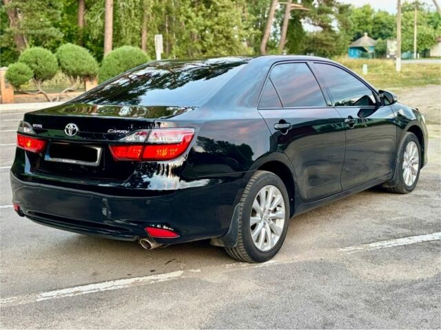 Черный Тойота Камри, объемом двигателя 2.5 л и пробегом 157 тыс. км за 16200 $, фото 4 на Automoto.ua