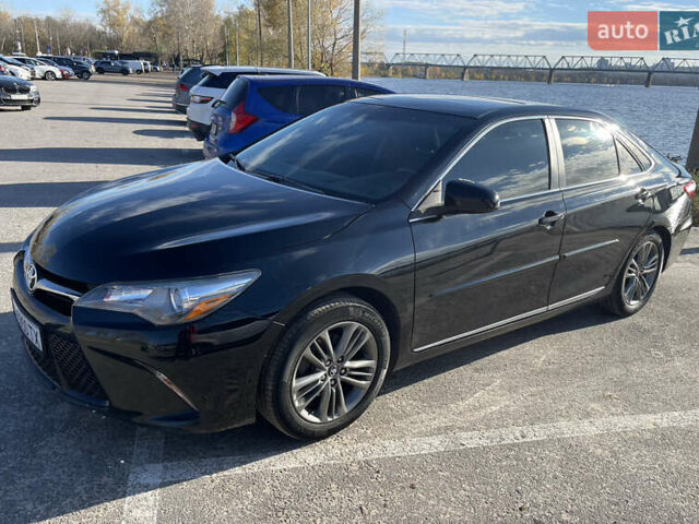 Черный Тойота Камри, объемом двигателя 2.49 л и пробегом 163 тыс. км за 15500 $, фото 1 на Automoto.ua