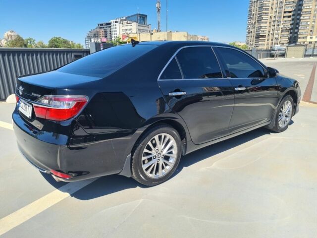 Черный Тойота Камри, объемом двигателя 2.5 л и пробегом 230 тыс. км за 16990 $, фото 18 на Automoto.ua