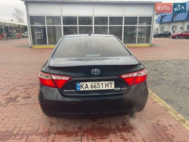 Черный Тойота Камри, объемом двигателя 2.5 л и пробегом 238 тыс. км за 13660 $, фото 1 на Automoto.ua