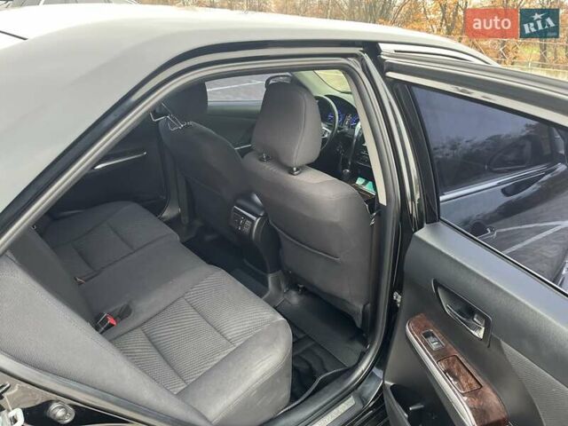 Черный Тойота Камри, объемом двигателя 2.5 л и пробегом 165 тыс. км за 16600 $, фото 15 на Automoto.ua