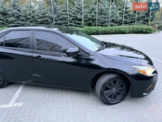 Черный Тойота Камри, объемом двигателя 2.5 л и пробегом 227 тыс. км за 14000 $, фото 20 на Automoto.ua