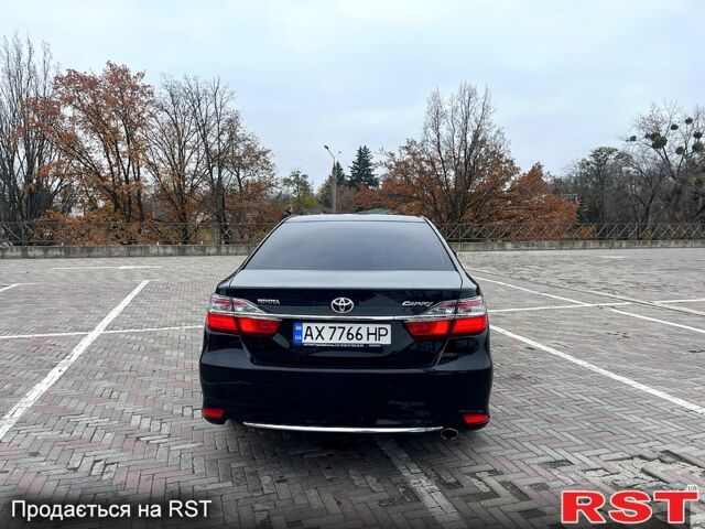 Черный Тойота Камри, объемом двигателя 2.5 л и пробегом 165 тыс. км за 16600 $, фото 8 на Automoto.ua