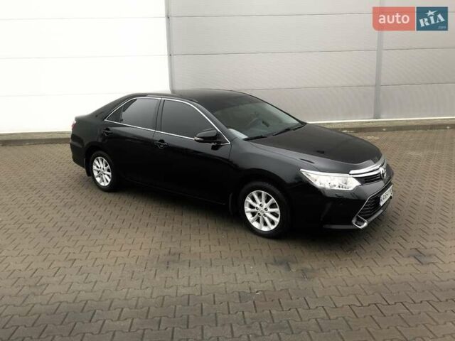 Черный Тойота Камри, объемом двигателя 2.5 л и пробегом 148 тыс. км за 17500 $, фото 1 на Automoto.ua