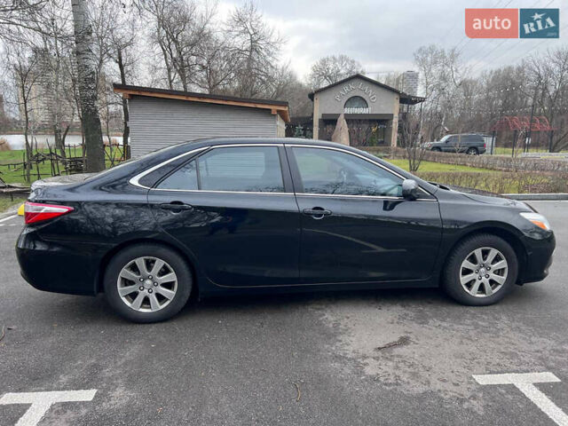 Чорний Тойота Камрі, об'ємом двигуна 2.49 л та пробігом 240 тис. км за 11800 $, фото 2 на Automoto.ua