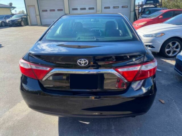 Черный Тойота Камри, объемом двигателя 2.5 л и пробегом 73 тыс. км за 5300 $, фото 3 на Automoto.ua