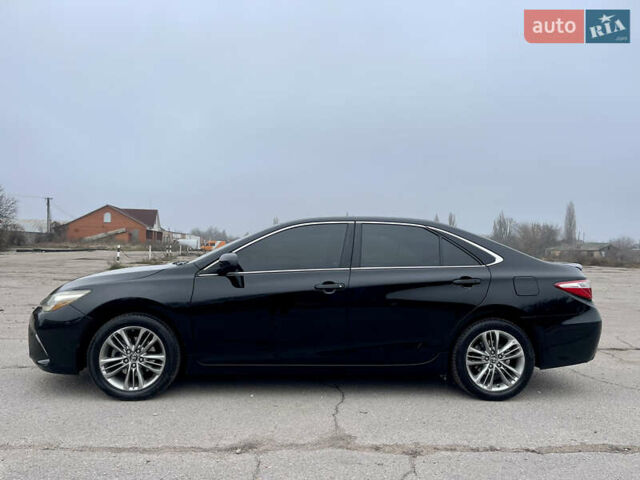 Черный Тойота Камри, объемом двигателя 2.49 л и пробегом 145 тыс. км за 11999 $, фото 3 на Automoto.ua