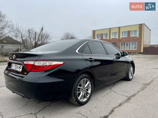 Черный Тойота Камри, объемом двигателя 2.49 л и пробегом 145 тыс. км за 11999 $, фото 9 на Automoto.ua