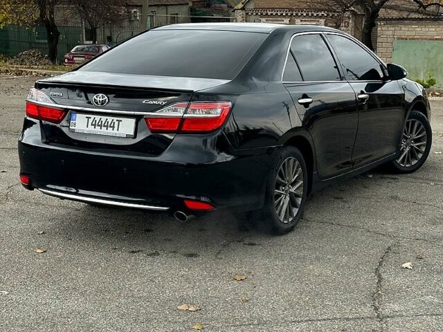Черный Тойота Камри, объемом двигателя 2.5 л и пробегом 185 тыс. км за 17000 $, фото 2 на Automoto.ua