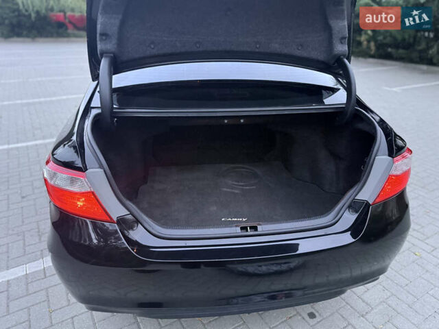 Черный Тойота Камри, объемом двигателя 2.5 л и пробегом 227 тыс. км за 14000 $, фото 21 на Automoto.ua