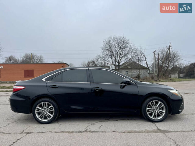 Черный Тойота Камри, объемом двигателя 2.49 л и пробегом 145 тыс. км за 11999 $, фото 8 на Automoto.ua