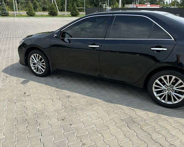 Черный Тойота Камри, объемом двигателя 2.5 л и пробегом 168 тыс. км за 18500 $, фото 5 на Automoto.ua