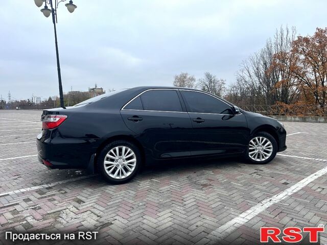 Черный Тойота Камри, объемом двигателя 2.5 л и пробегом 165 тыс. км за 16600 $, фото 9 на Automoto.ua