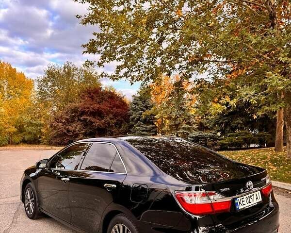 Чорний Тойота Камрі, об'ємом двигуна 2.49 л та пробігом 148 тис. км за 21000 $, фото 4 на Automoto.ua