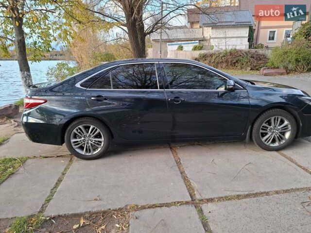 Черный Тойота Камри, объемом двигателя 2.49 л и пробегом 180 тыс. км за 15500 $, фото 2 на Automoto.ua