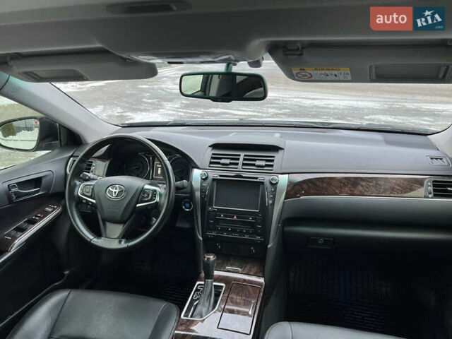 Черный Тойота Камри, объемом двигателя 2.49 л и пробегом 145 тыс. км за 18350 $, фото 68 на Automoto.ua