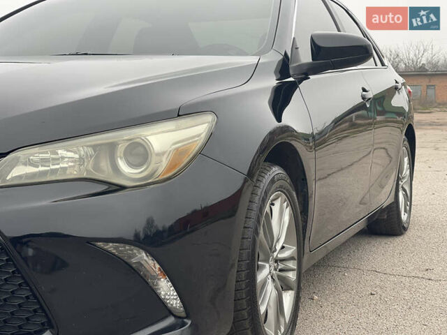 Черный Тойота Камри, объемом двигателя 2.49 л и пробегом 145 тыс. км за 11999 $, фото 10 на Automoto.ua