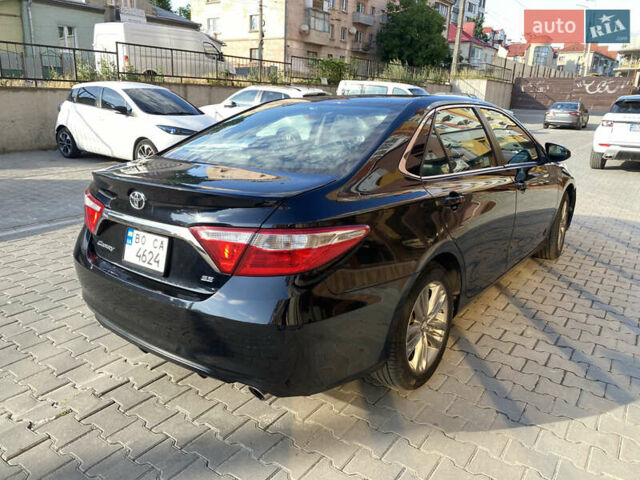 Чорний Тойота Камрі, об'ємом двигуна 2.49 л та пробігом 195 тис. км за 14000 $, фото 14 на Automoto.ua