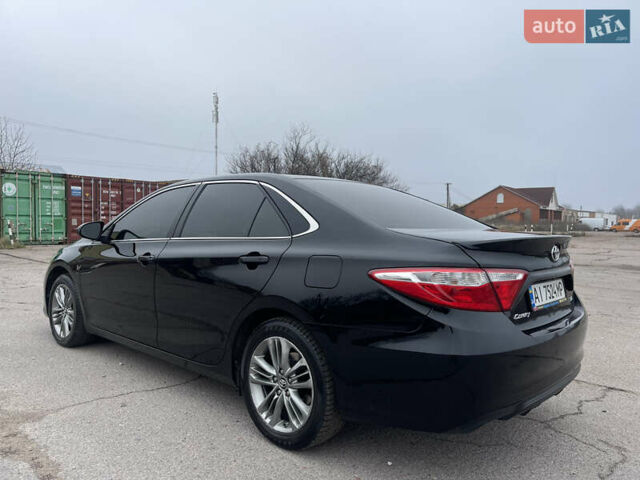 Черный Тойота Камри, объемом двигателя 2.49 л и пробегом 145 тыс. км за 11999 $, фото 4 на Automoto.ua