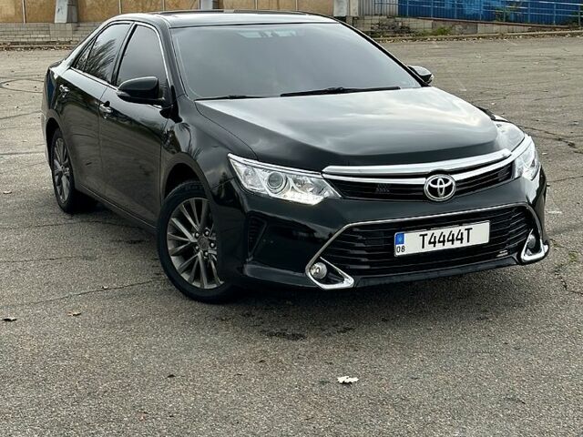 Черный Тойота Камри, объемом двигателя 2.5 л и пробегом 185 тыс. км за 17000 $, фото 1 на Automoto.ua