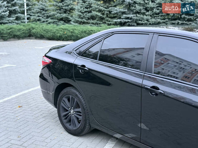 Черный Тойота Камри, объемом двигателя 2.5 л и пробегом 227 тыс. км за 14000 $, фото 19 на Automoto.ua