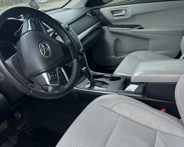 Чорний Тойота Камрі, об'ємом двигуна 2.49 л та пробігом 174 тис. км за 12500 $, фото 4 на Automoto.ua