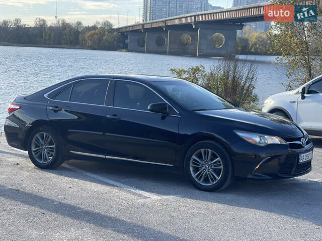 Черный Тойота Камри, объемом двигателя 2.49 л и пробегом 163 тыс. км за 15500 $, фото 2 на Automoto.ua