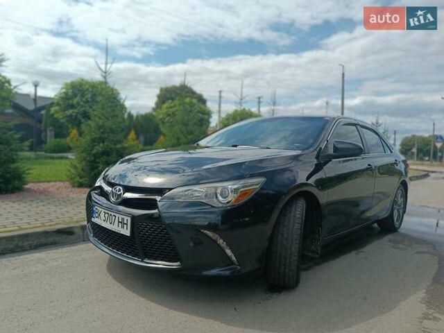 Черный Тойота Камри, объемом двигателя 2.5 л и пробегом 174 тыс. км за 14500 $, фото 1 на Automoto.ua