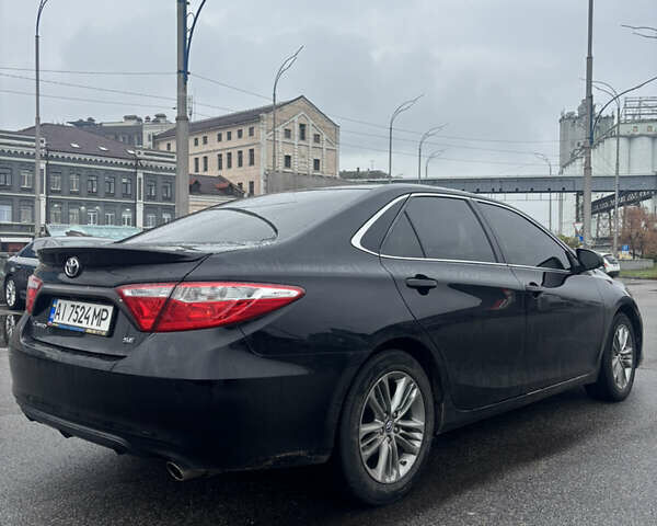 Черный Тойота Камри, объемом двигателя 2.5 л и пробегом 143 тыс. км за 12900 $, фото 3 на Automoto.ua