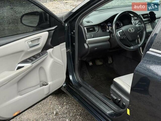 Чорний Тойота Камрі, об'ємом двигуна 2.49 л та пробігом 75 тис. км за 12900 $, фото 12 на Automoto.ua