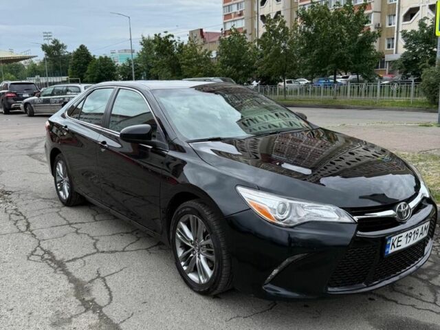 Черный Тойота Камри, объемом двигателя 2.5 л и пробегом 142 тыс. км за 13700 $, фото 1 на Automoto.ua