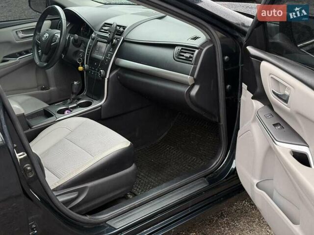 Чорний Тойота Камрі, об'ємом двигуна 2.49 л та пробігом 75 тис. км за 12900 $, фото 23 на Automoto.ua