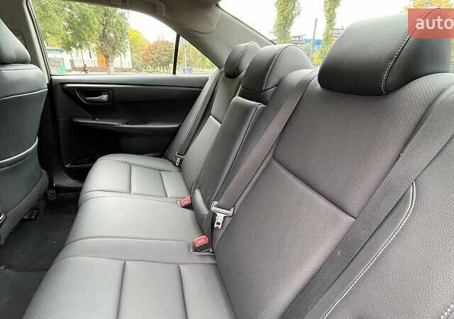Черный Тойота Камри, объемом двигателя 2.5 л и пробегом 205 тыс. км за 12500 $, фото 3 на Automoto.ua
