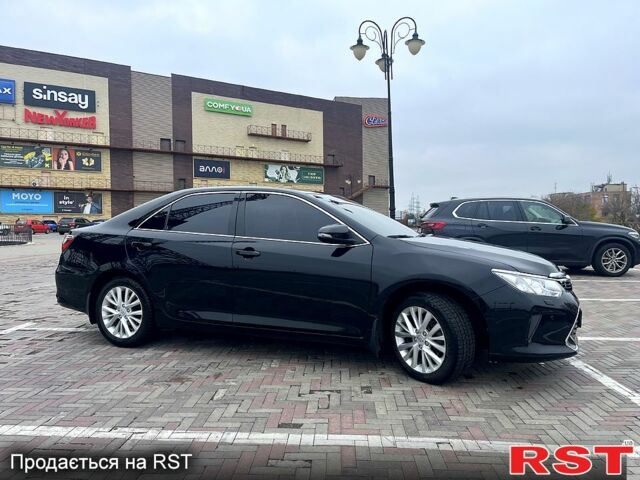 Черный Тойота Камри, объемом двигателя 2.5 л и пробегом 165 тыс. км за 16600 $, фото 10 на Automoto.ua