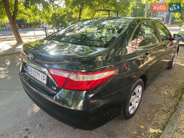 Чорний Тойота Камрі, об'ємом двигуна 2.49 л та пробігом 183 тис. км за 9900 $, фото 1 на Automoto.ua