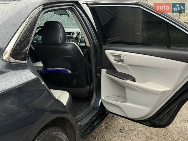 Чорний Тойота Камрі, об'ємом двигуна 2.49 л та пробігом 75 тис. км за 12900 $, фото 21 на Automoto.ua