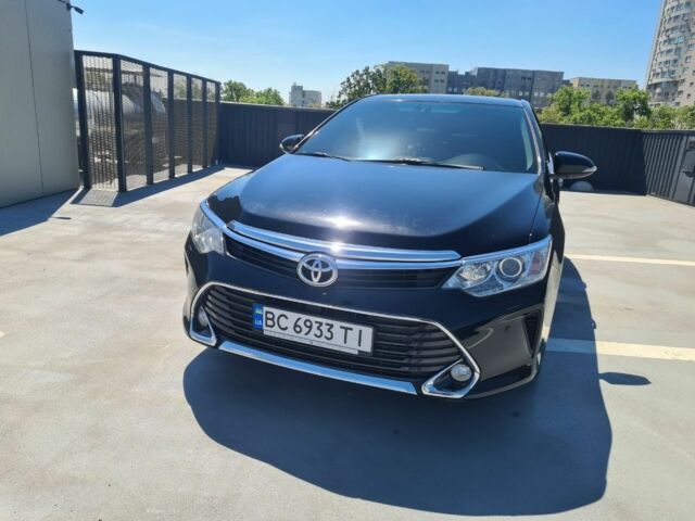 Черный Тойота Камри, объемом двигателя 2.5 л и пробегом 230 тыс. км за 16990 $, фото 23 на Automoto.ua