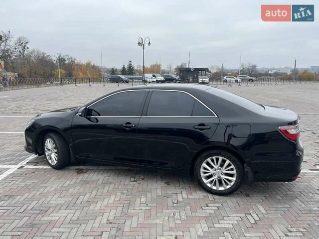 Черный Тойота Камри, объемом двигателя 2.5 л и пробегом 165 тыс. км за 16600 $, фото 2 на Automoto.ua