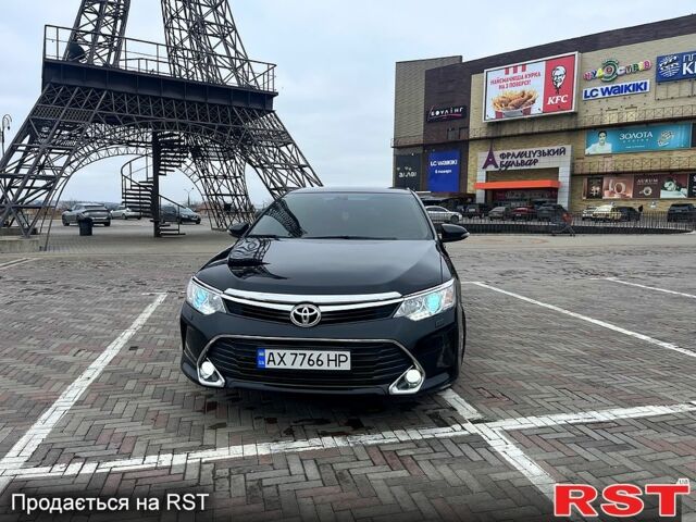 Черный Тойота Камри, объемом двигателя 2.5 л и пробегом 165 тыс. км за 16600 $, фото 1 на Automoto.ua