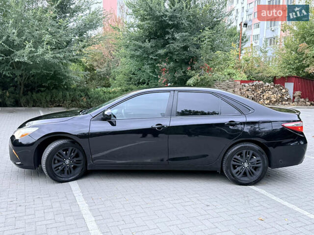 Черный Тойота Камри, объемом двигателя 2.5 л и пробегом 227 тыс. км за 14000 $, фото 8 на Automoto.ua