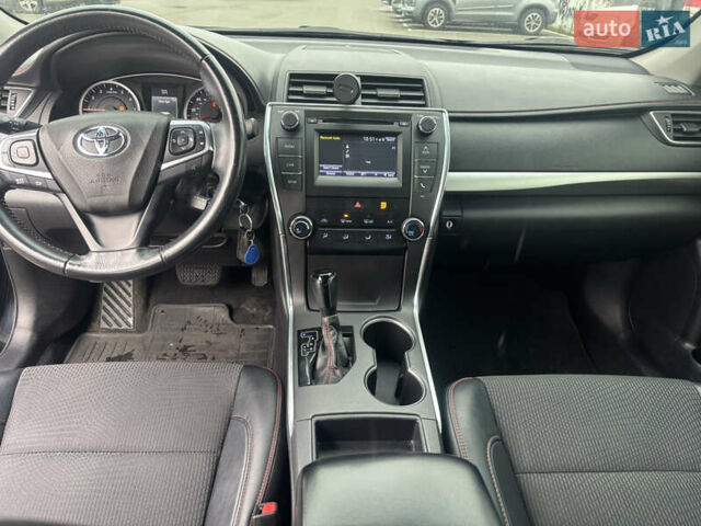 Черный Тойота Камри, объемом двигателя 2.5 л и пробегом 143 тыс. км за 12900 $, фото 13 на Automoto.ua