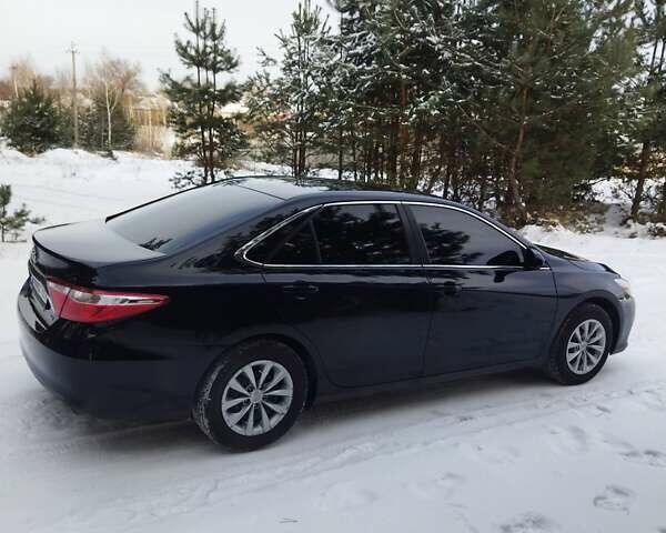 Черный Тойота Камри, объемом двигателя 2.5 л и пробегом 142 тыс. км за 15800 $, фото 4 на Automoto.ua