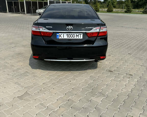 Черный Тойота Камри, объемом двигателя 2.5 л и пробегом 168 тыс. км за 18500 $, фото 7 на Automoto.ua