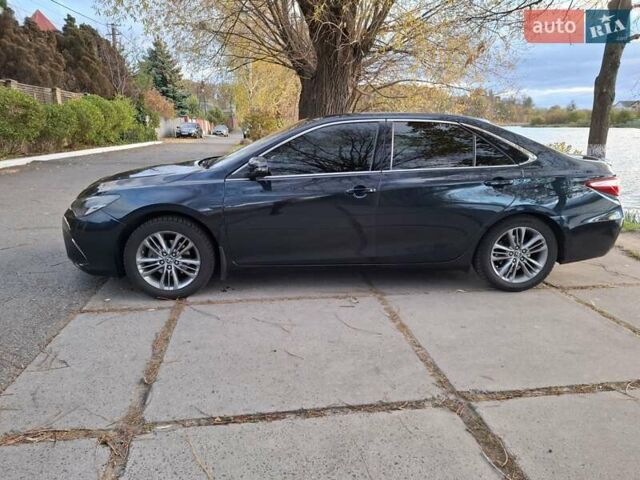 Черный Тойота Камри, объемом двигателя 2.49 л и пробегом 180 тыс. км за 15500 $, фото 3 на Automoto.ua