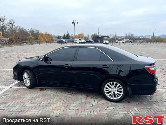 Черный Тойота Камри, объемом двигателя 2.5 л и пробегом 165 тыс. км за 16600 $, фото 4 на Automoto.ua