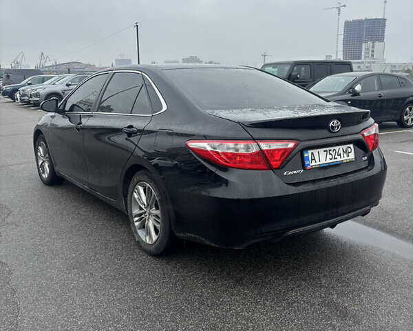 Черный Тойота Камри, объемом двигателя 2.5 л и пробегом 143 тыс. км за 12900 $, фото 5 на Automoto.ua