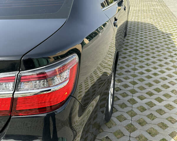 Черный Тойота Камри, объемом двигателя 2.5 л и пробегом 190 тыс. км за 16900 $, фото 7 на Automoto.ua