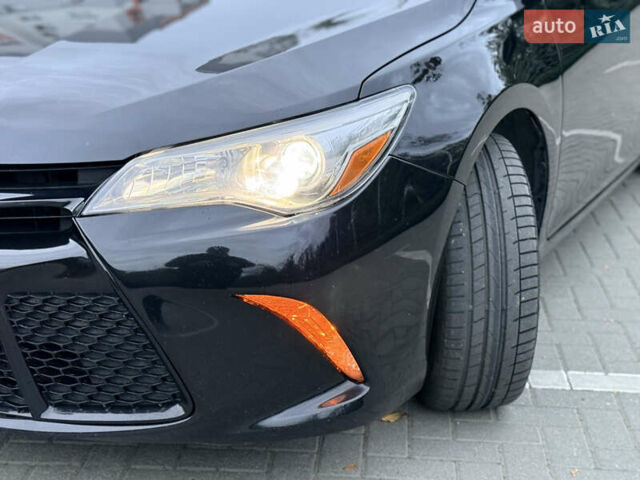 Черный Тойота Камри, объемом двигателя 2.5 л и пробегом 227 тыс. км за 14000 $, фото 1 на Automoto.ua