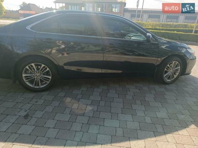 Черный Тойота Камри, объемом двигателя 2.5 л и пробегом 174 тыс. км за 14500 $, фото 15 на Automoto.ua