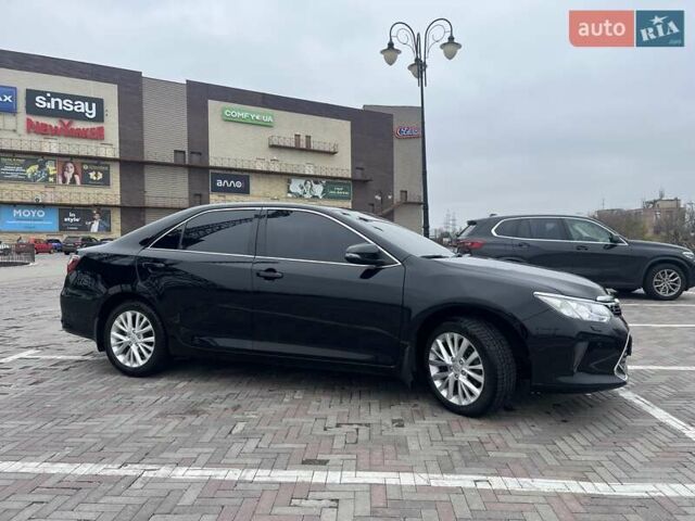 Черный Тойота Камри, объемом двигателя 2.5 л и пробегом 165 тыс. км за 16600 $, фото 4 на Automoto.ua